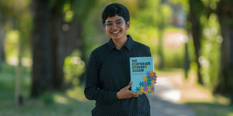 Dr Akshaya Kamalnath holds her book, 'The Corporate Diversity Jigsaw'