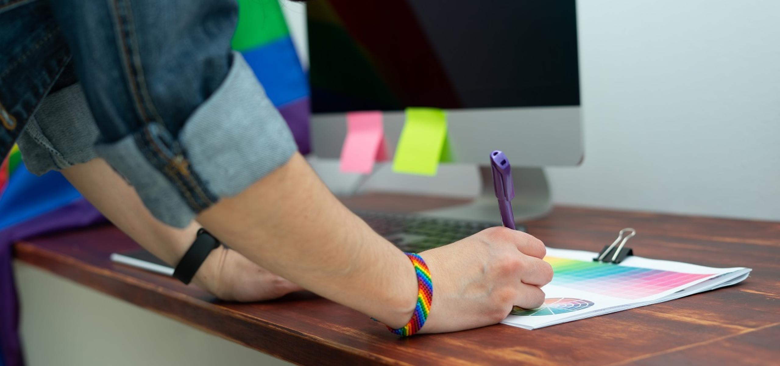 Person writing with pen