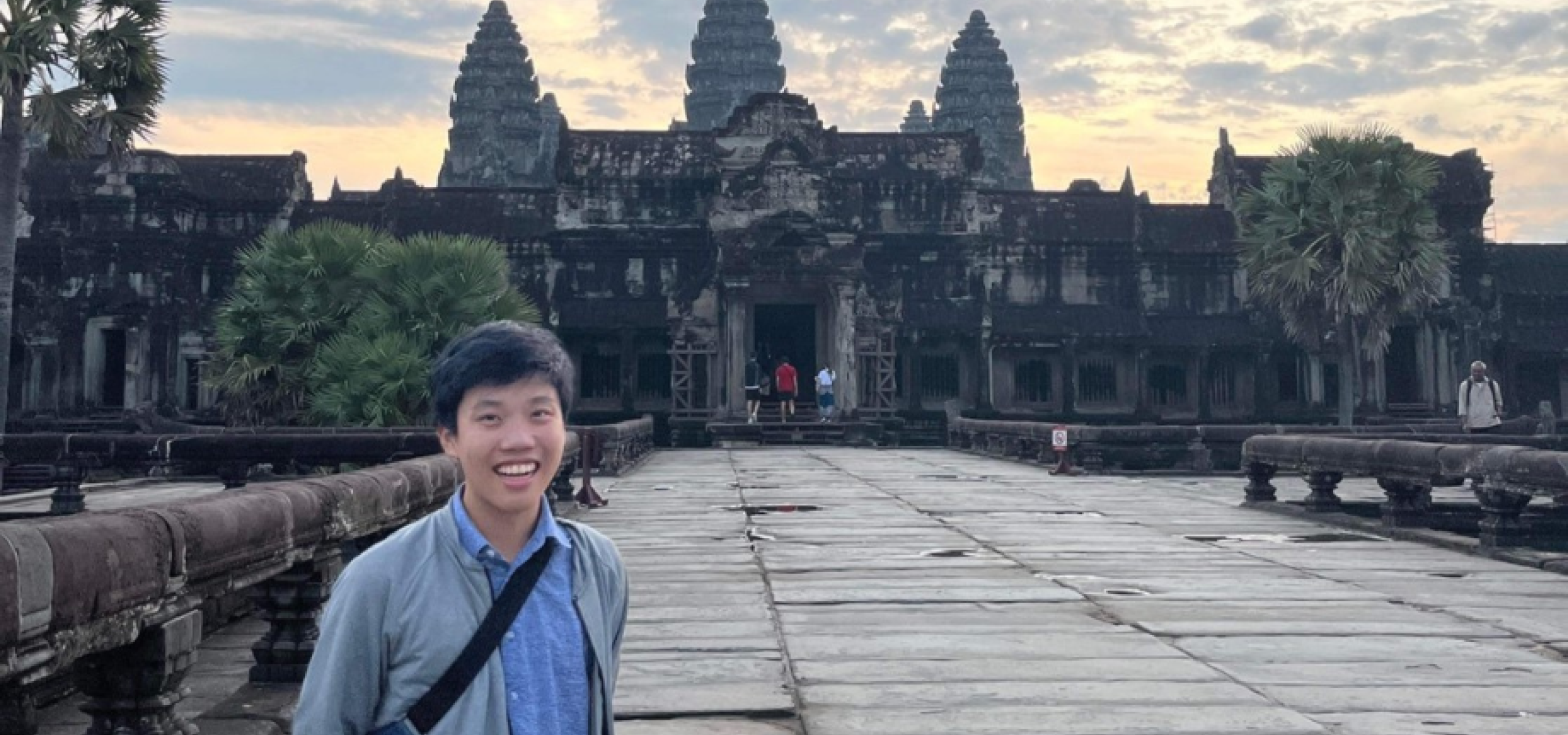 ANU Law student ambassador Andre Kwok outside Angkor Wat in Cambodia, an ASEAN party state.